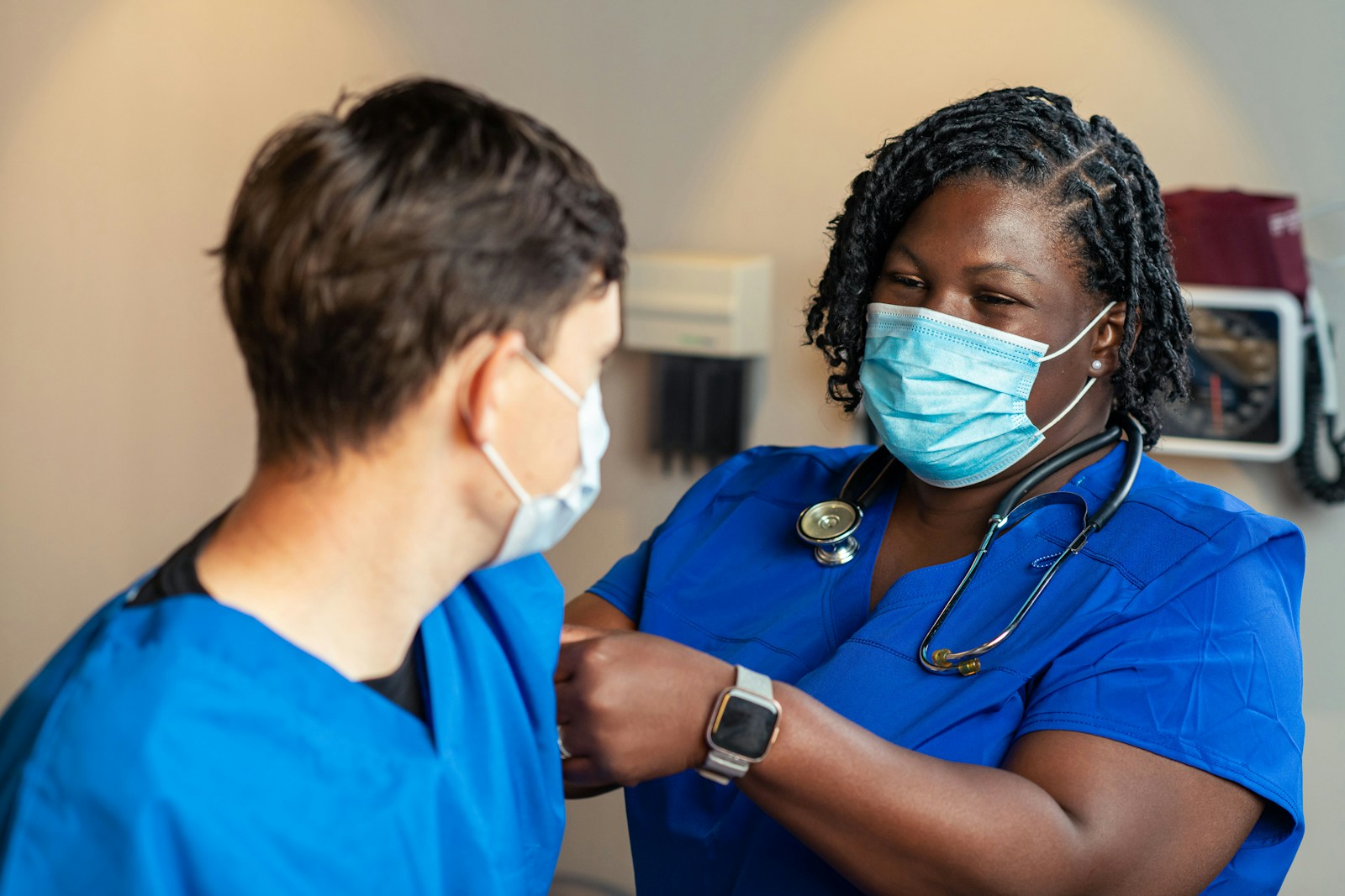 Two nursing professionals learning together